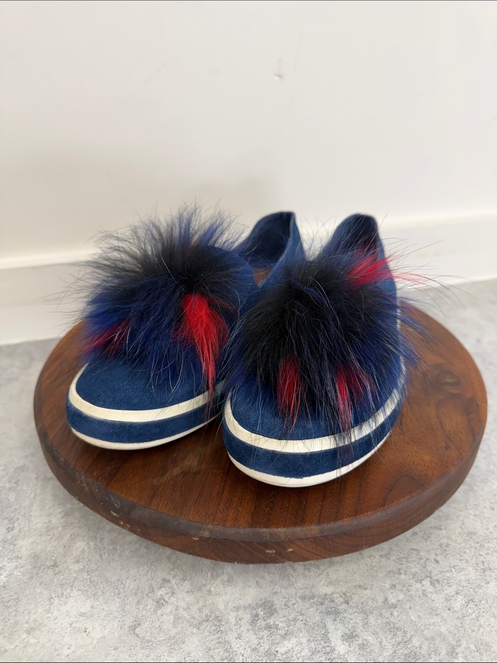 Sondra Roberts Navy Slip-On Sneakers with Red and Black Faux-Fur Poms‎
